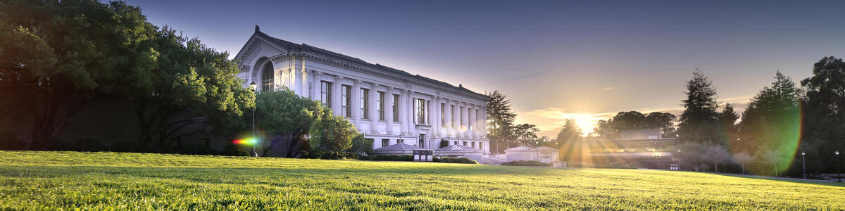 Decorative image of the Doe Library and Memorial Glade during sunset